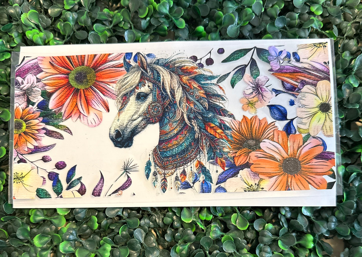 Horse with feather and flowers