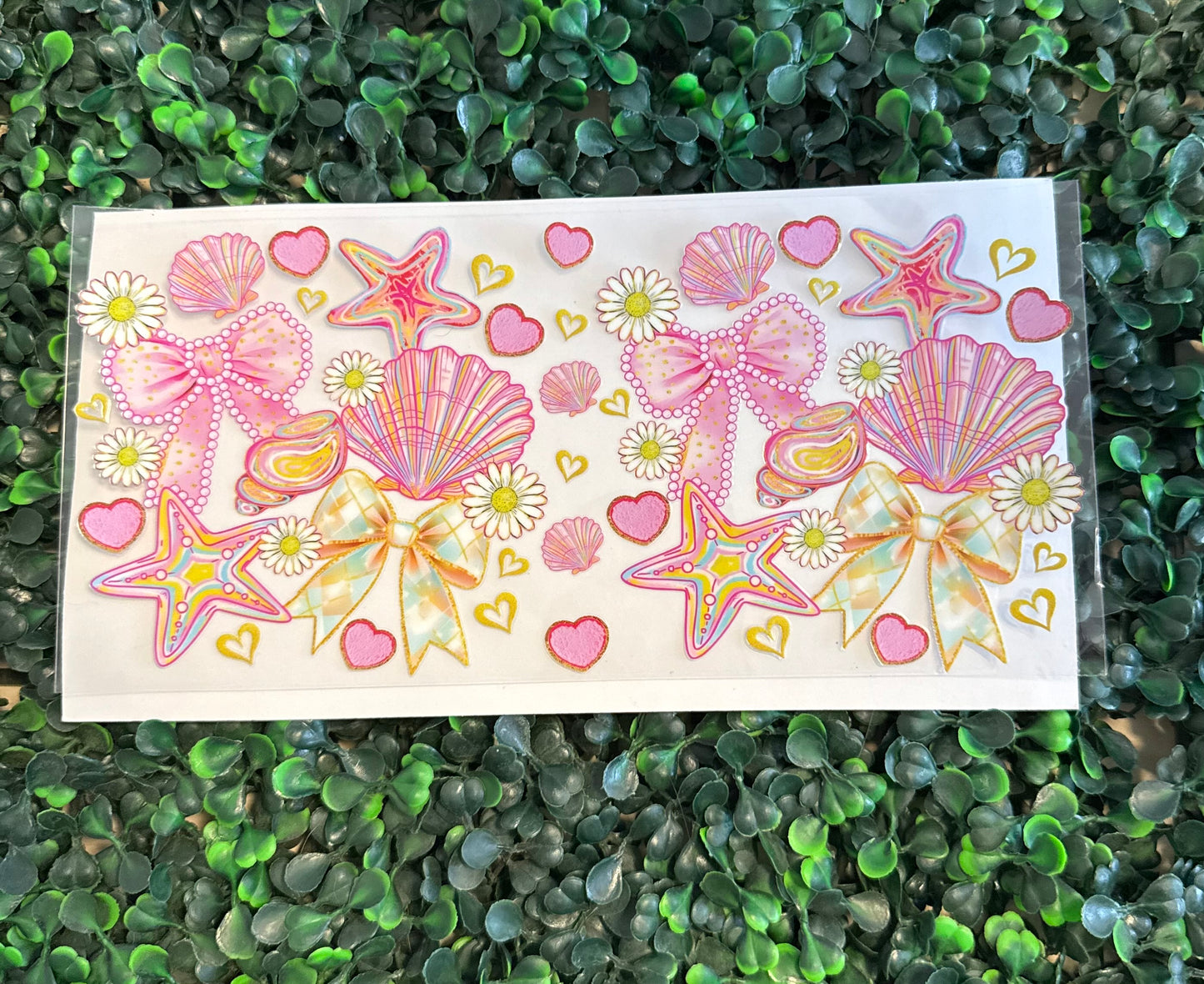 Pink bows and shells