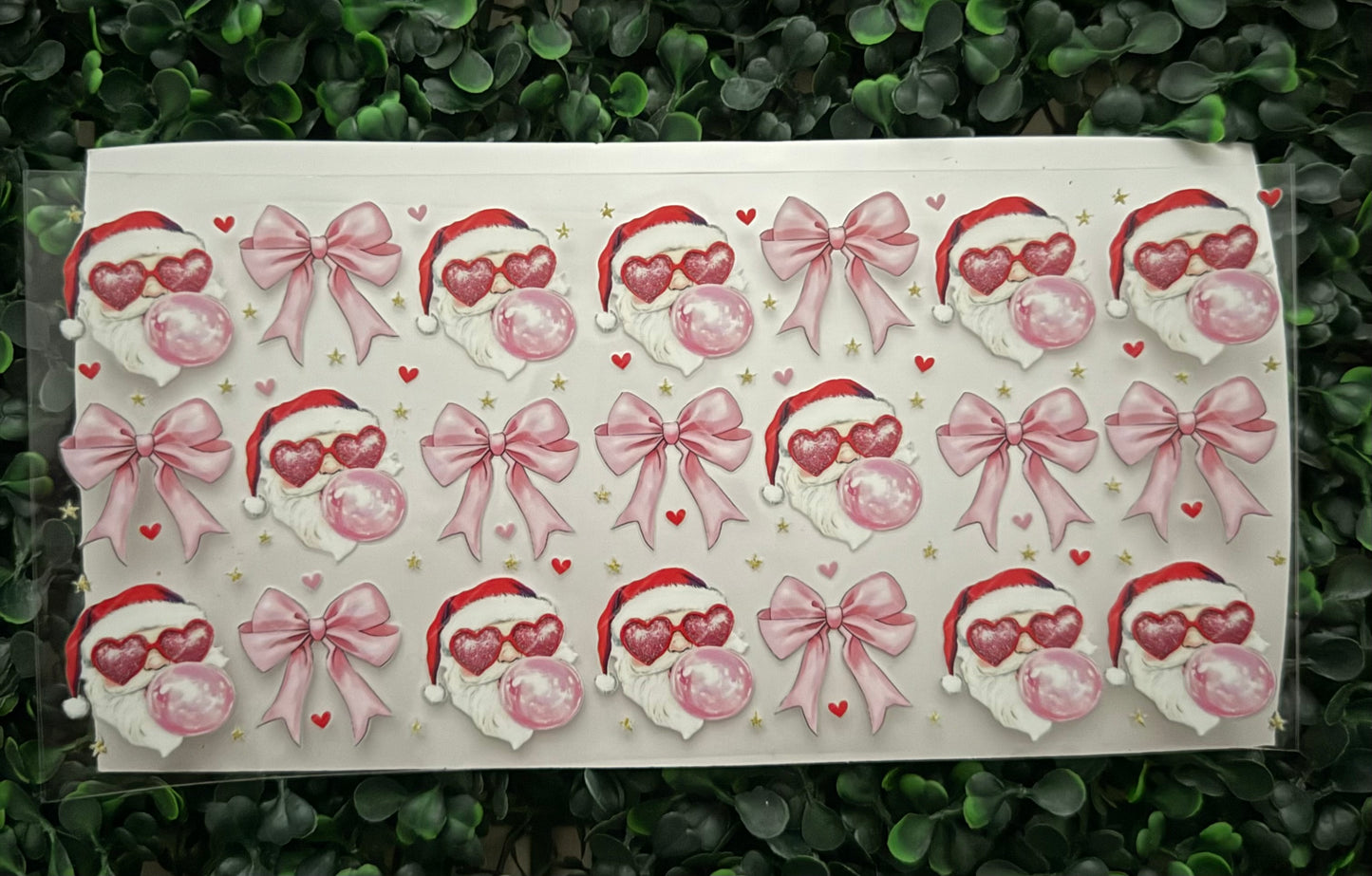 Santa blowing bubble gum pink bow