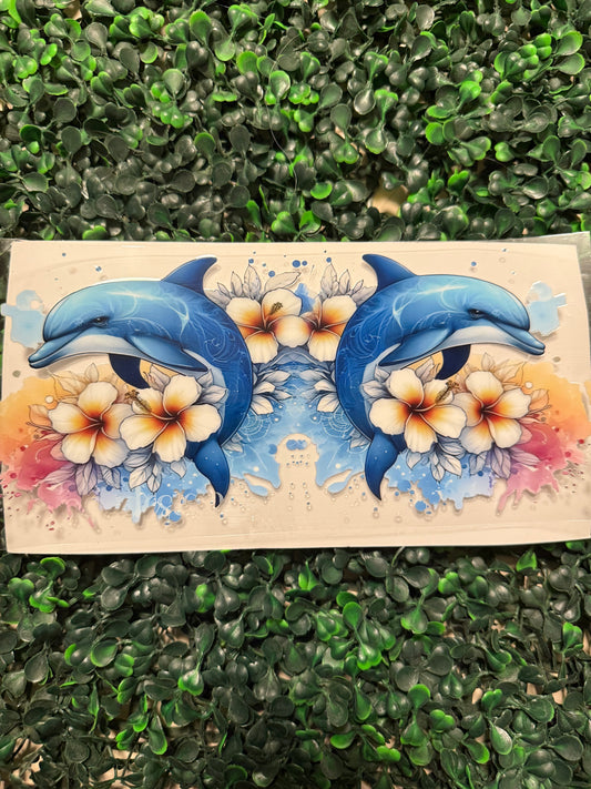 Dolphins with white hibiscus flowers 