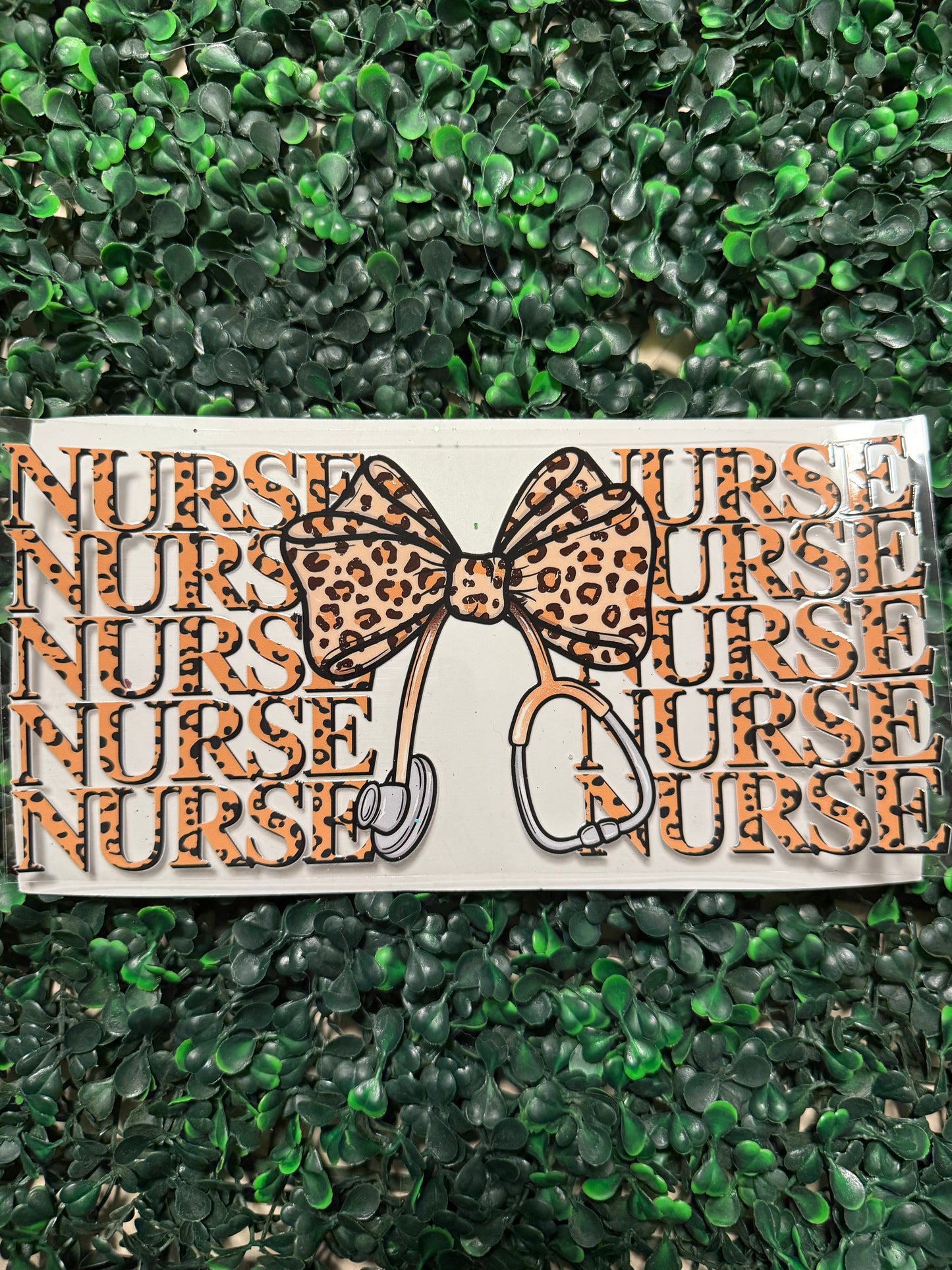 Cheetah print nurse with bow and stethoscope