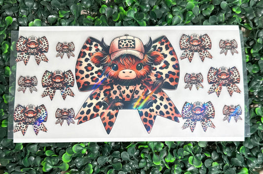 Holographic cheetah print bow and cows