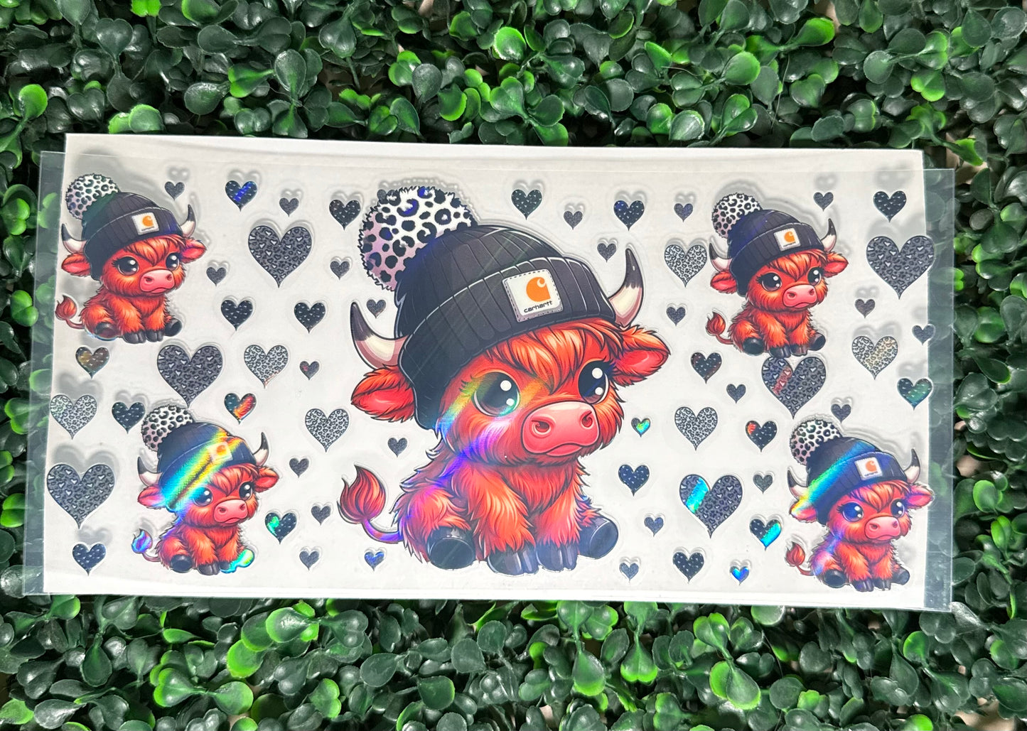 Holographic cow with beanie