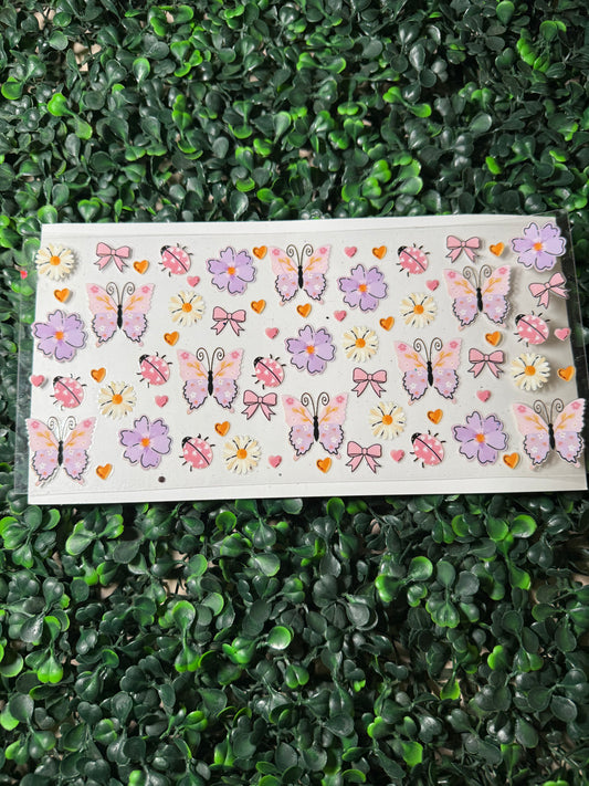 Pink and purple butterflies and ladybugs
