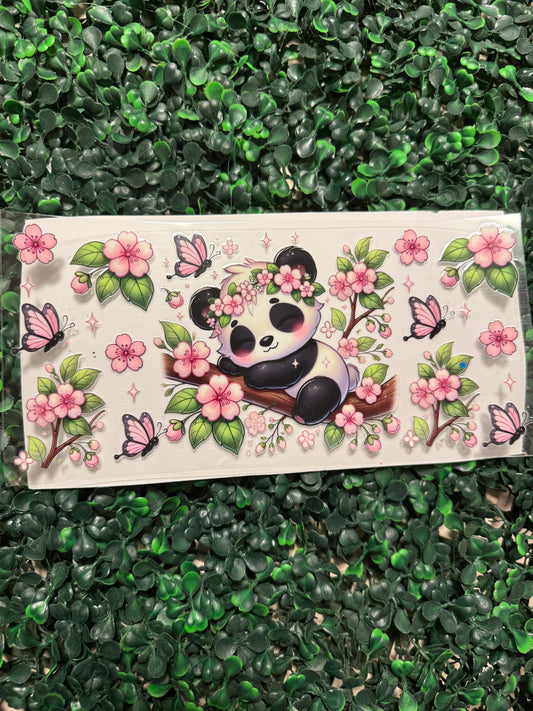 Sleepy panda with pink flowers