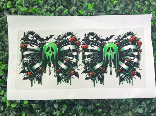 giant bow with green ghost