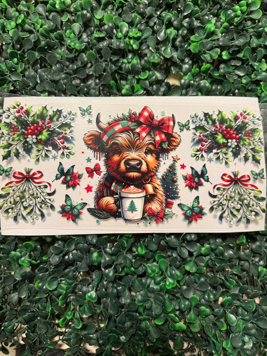 Red and green Christmas cow with coco