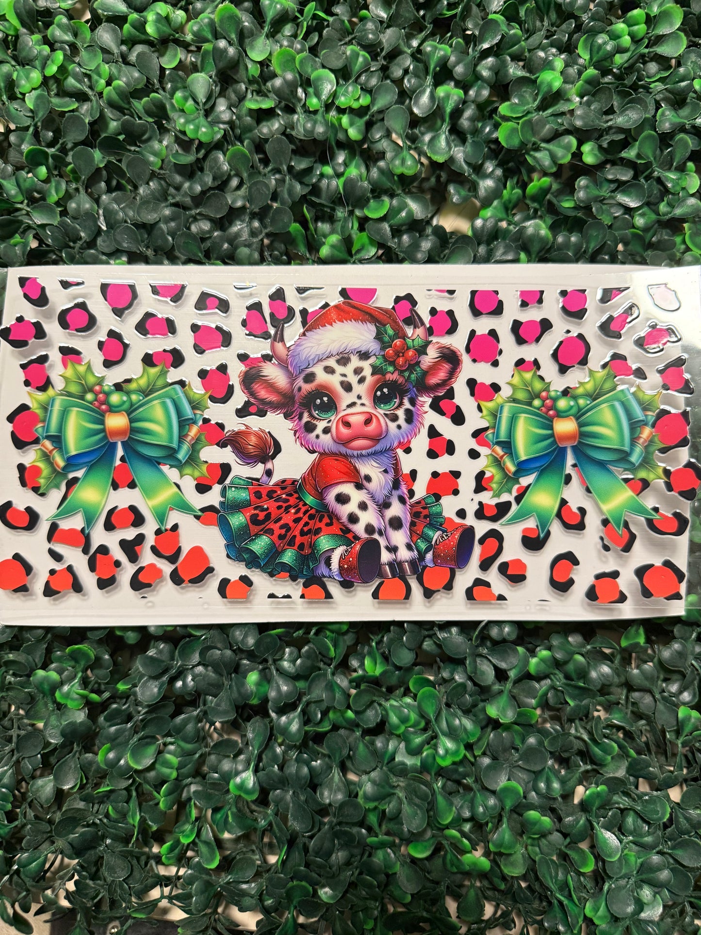 Red cheetah print cow with green bow