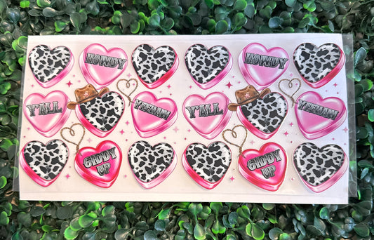Cow print hearts with cowboy hats