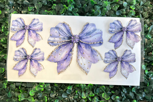 Purple and gold bows