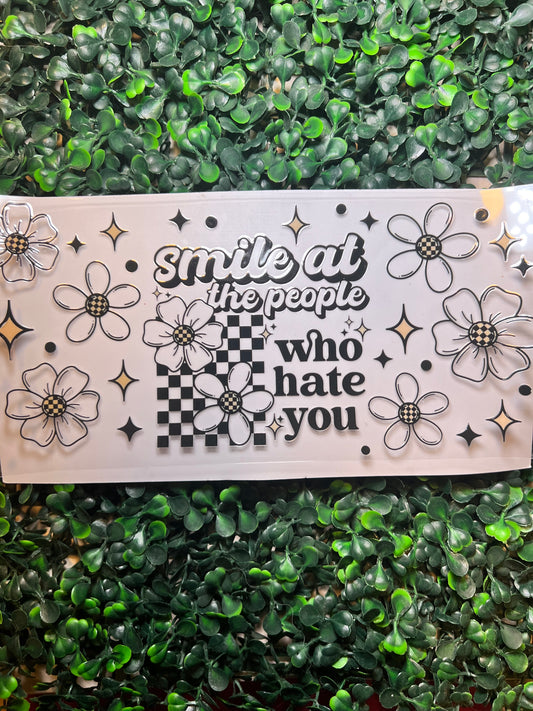 Smile at the people who hate you white daisies￼￼